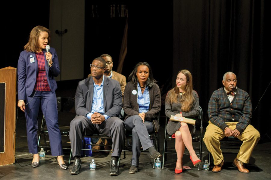 Robin Rue Simmons speaks at a candidate forum on Jan. 19. She and Carolyn Murray, seated second from the left, will face off in the general election on April 4.