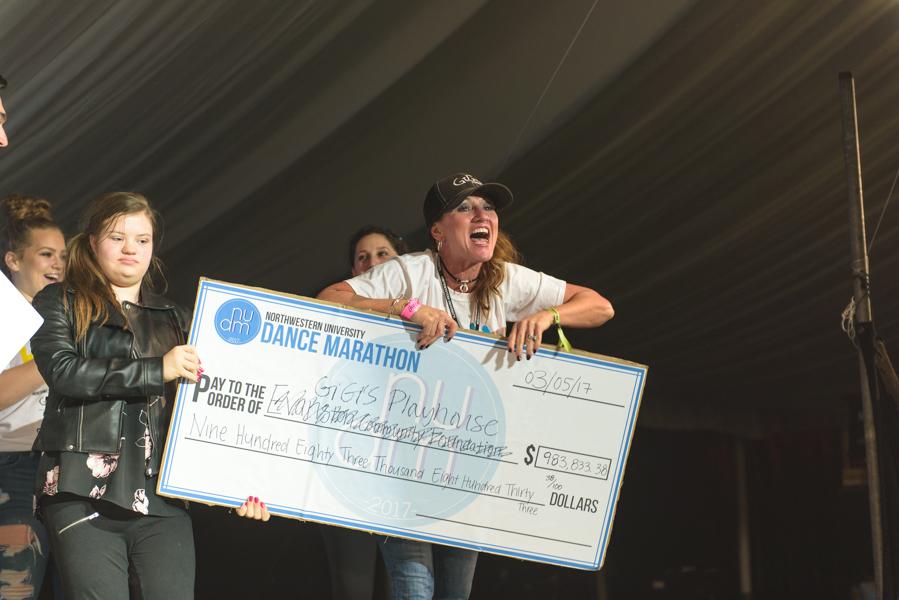 Nancy Gianni, CEO of GiGi’s Playhouse, celebrates after being handed the final check at the end of Block 10. GiGi’s Playhouse received $983,833, the largest check DM has presented to its primary beneficiary.