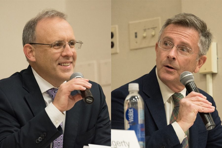 Businessman Steve Hagerty and Ald. Mark Tendam (6th) speak Feb. 7 at a mayoral debate. The two candidates have started to shift the focus of their campaigns toward next month’s general election.
