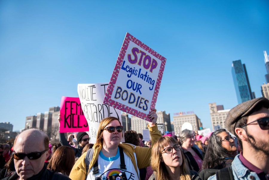 Protesters rally earlier this year for the Women’s March on Chicago. On Tuesday, the Illinois House passed a bill to protect abortions and allow tax money to go toward the procedure. 