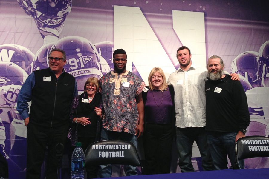 Attendees pose at a CatBackers event about the NFL draft Tuesday. CatBackers was founded in 1997 as an all-women’s NU sports fan organization. 