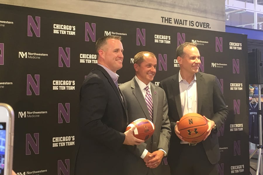 Pat Fitzgerald (left), Jim Phillips and Chris Collins pose for a photo. Phillips announced new contracts for Fitzgerald and Collins on Tuesday. 
