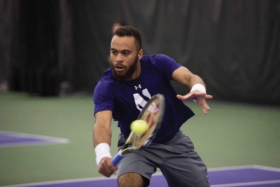 Sam Shropshire lunges for a volley. The senior helped the Wildcats to a pair of Big Ten wins this weekend.
