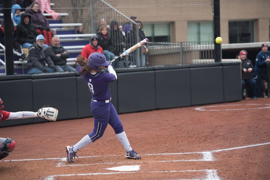Lily Novak swings at a pitch. The sophomore infielder and the Wildcats were blown out by Notre Dame on Tuesday.