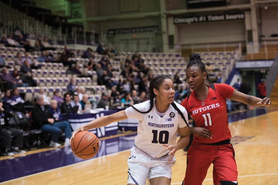 Nia Coffey races past a defender. The former NU player was selected fifth overall in the WNBA Draft on Thursday.