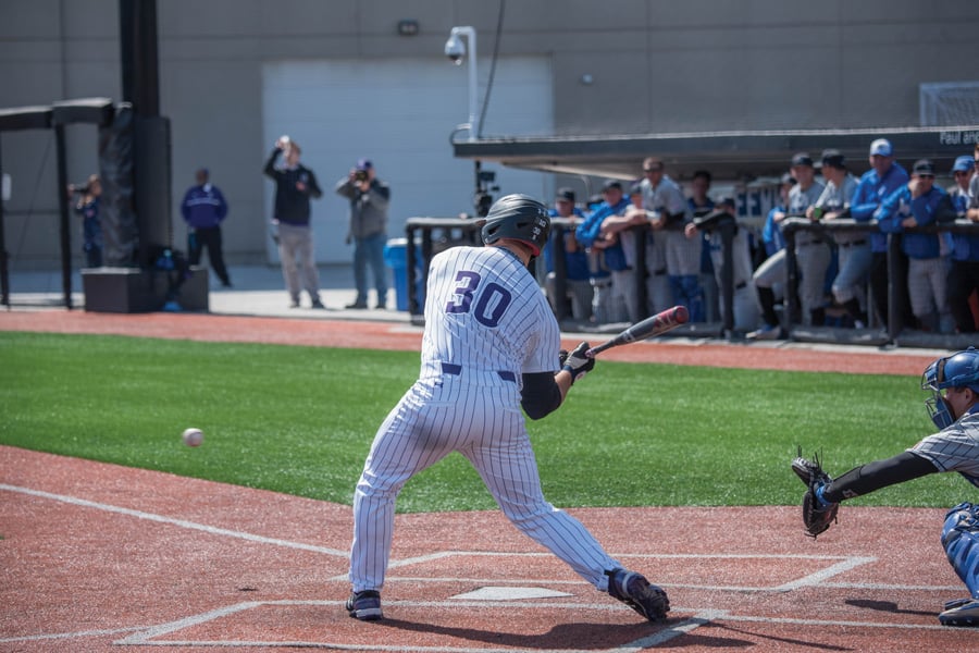 Joe Hoscheit swings. The senior outfielder leads the Wildcats in home runs and slugging percentage.