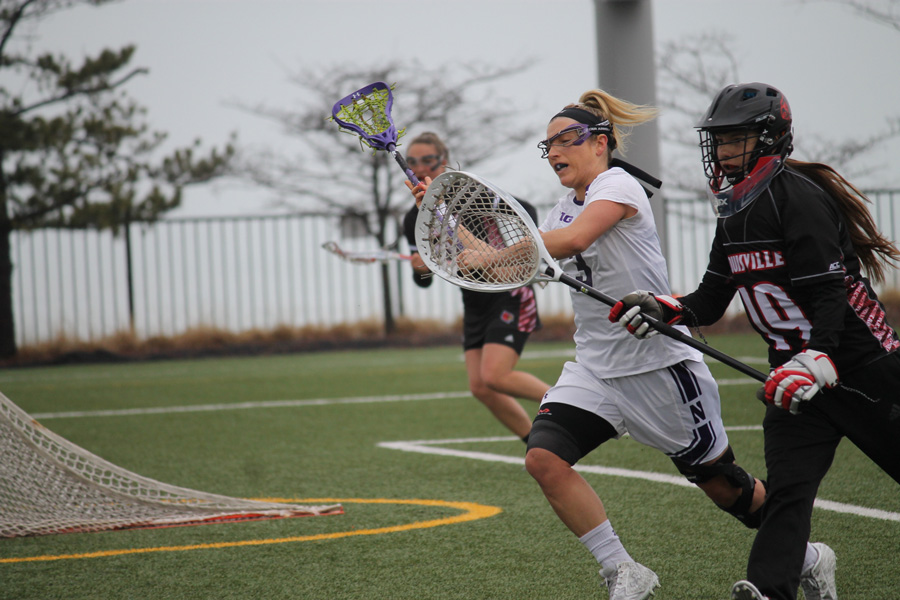 Christina Esposito races past a defender. The attacker was the focal point of NU’s recruiting class in 2012.