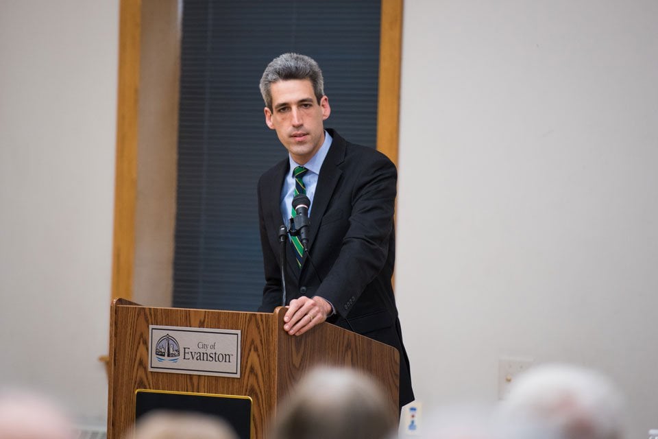 State Sen. Daniel Biss (D-Evanston) talks with constituents after a town hall meeting in 2015. A bill sponsored by Biss that would use public funds to match small donor contributions passed in the state Senate Tuesday.