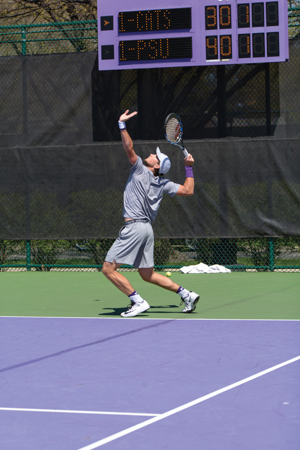 Strong+Kirchheimer+reaches+to+serve.+The+senior+is+one+of+two+NU+players+set+to+compete+at+the+NCAA+Singles+Tournament.