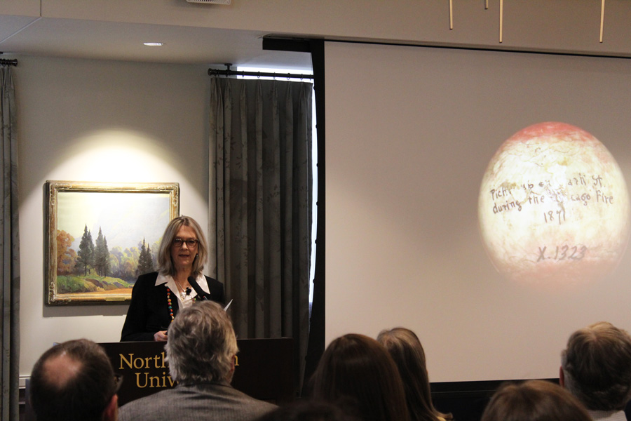 Visiting Prof. Pippa Skotnes speaks Monday in Scott Hall. Skotnes used a charred billiards ball from the Great Chicago Fire to explain her archival research on the San peoples.