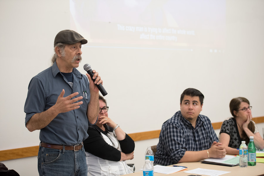 Jorge Mújica speaks on the panel. Mújica said that policies affecting immigrants are “pretty much exactly” the same as they were four years ago. 