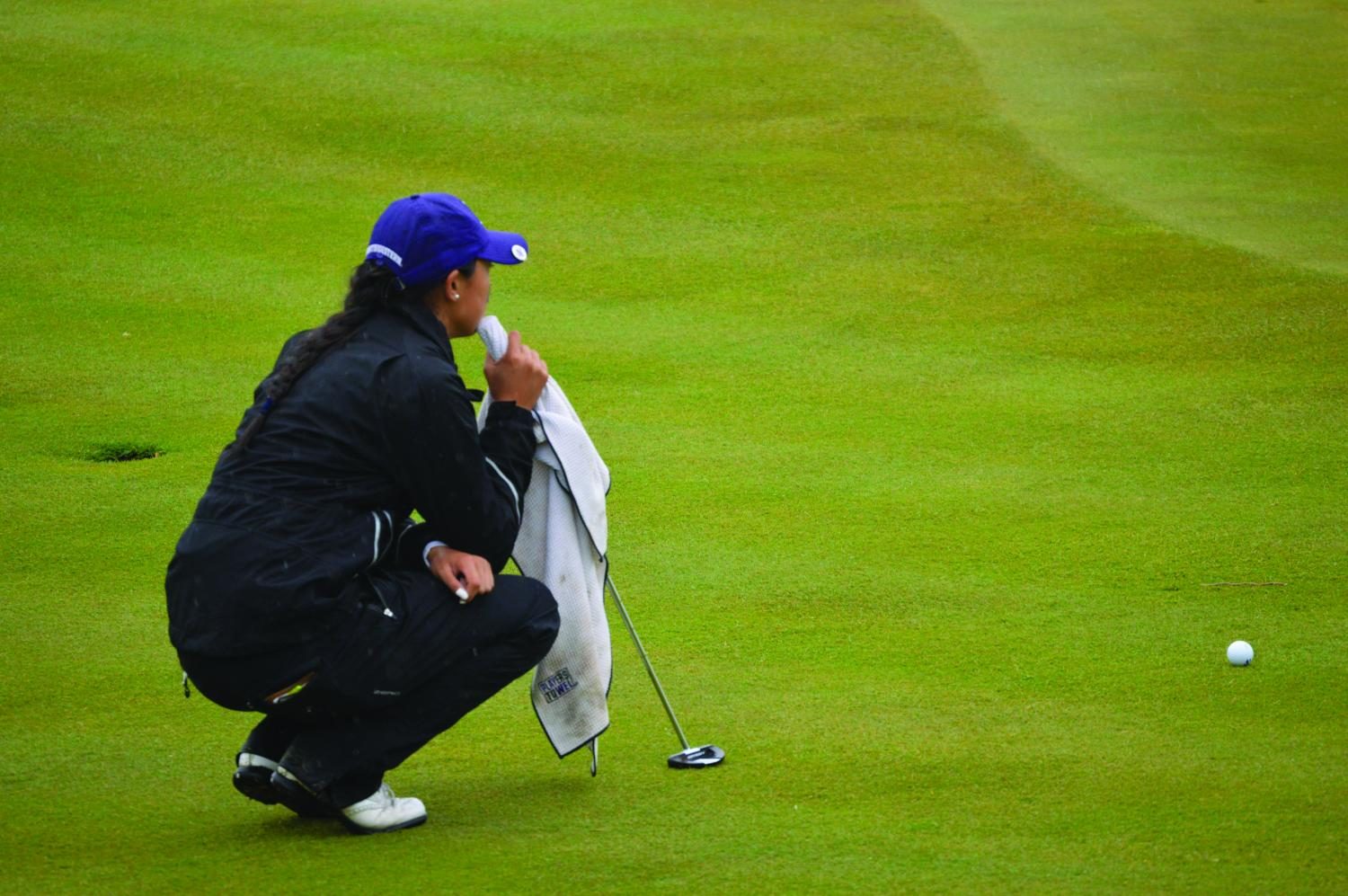 Janet Mao thinks through a putt. The sophomore and the Wildcats fell to Arizona State in the National Championship match Wednesday.