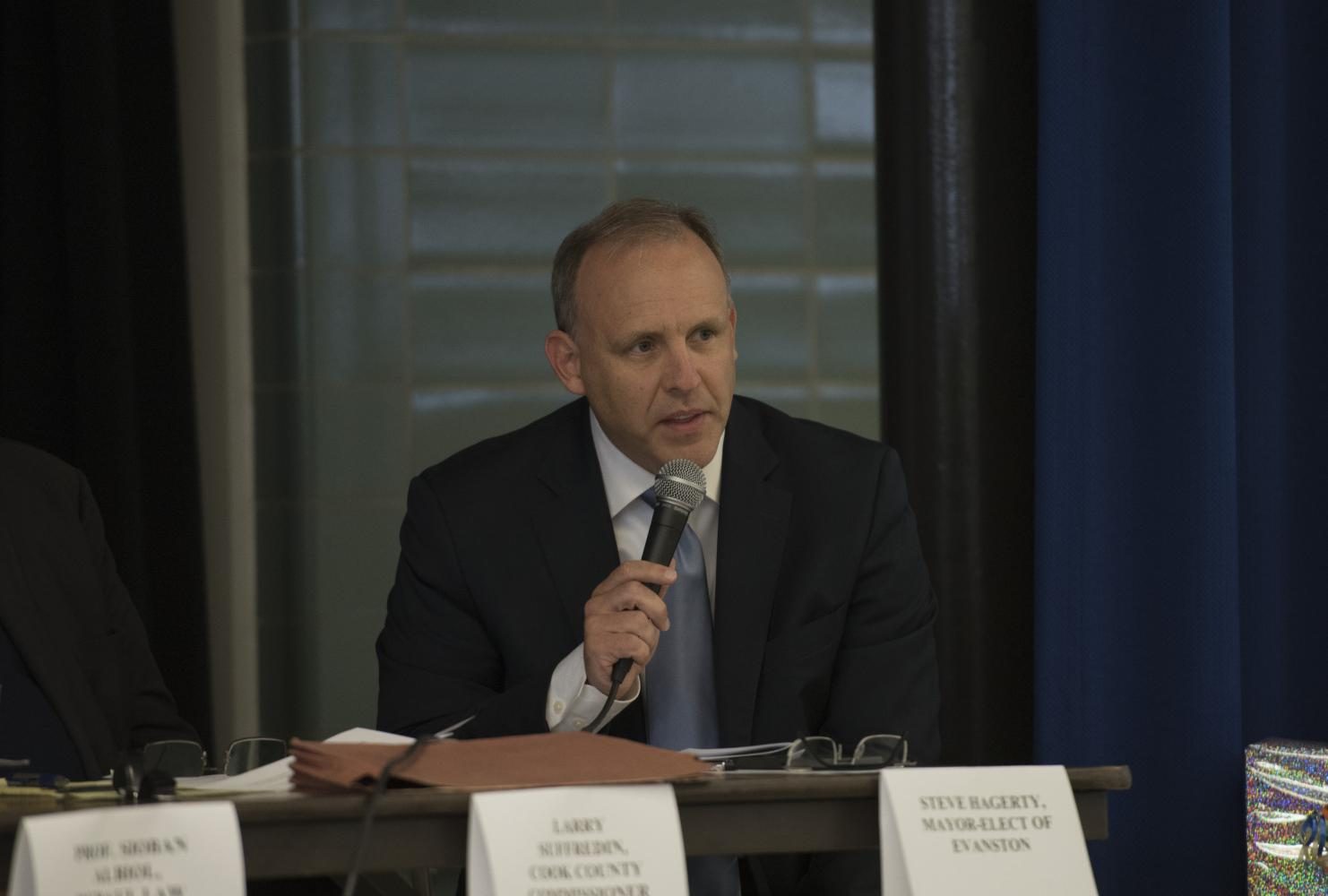 Evanston mayor Steve Hagerty speaks at a panel. Hagerty joined an effort by Chicago mayor Rahm Emanuel and 11 other mayors nationwide to post climate change information on their cities websites starting Sunday.