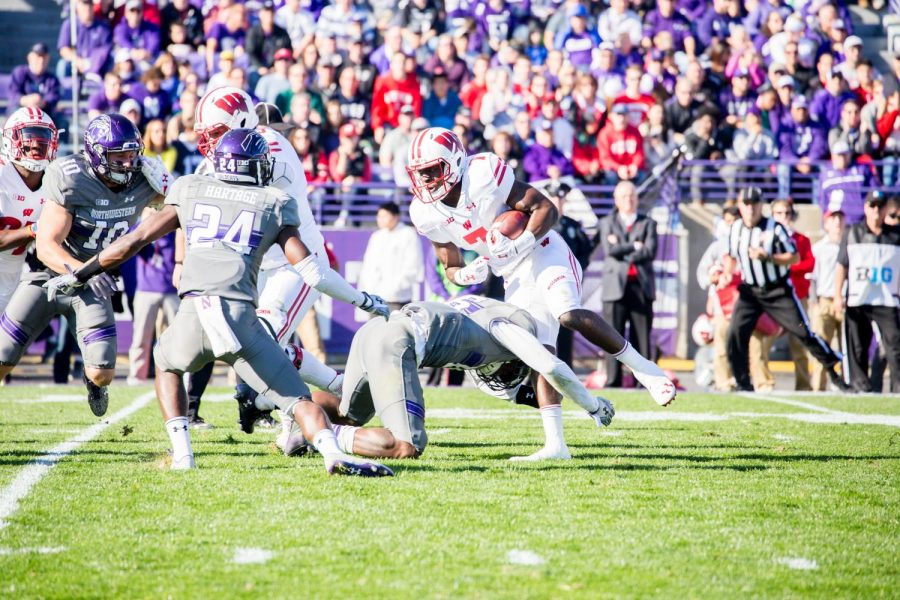 Wisconsin running back Bradrick Shaw evades Northwestern defenders in a 2016 game. This year’s meeting between the two teams is likely to be critical in deciding the Big Ten West standings.