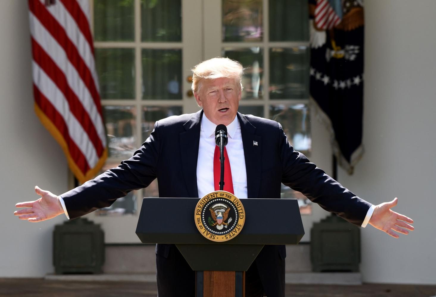 President Donald Trump in the Rose Garden Thursday announcing he will withdraw from the Paris Accord. In Evanston, both Mayor Steve Hagerty and University President Morton Schapiro criticized Trumps decision. 
