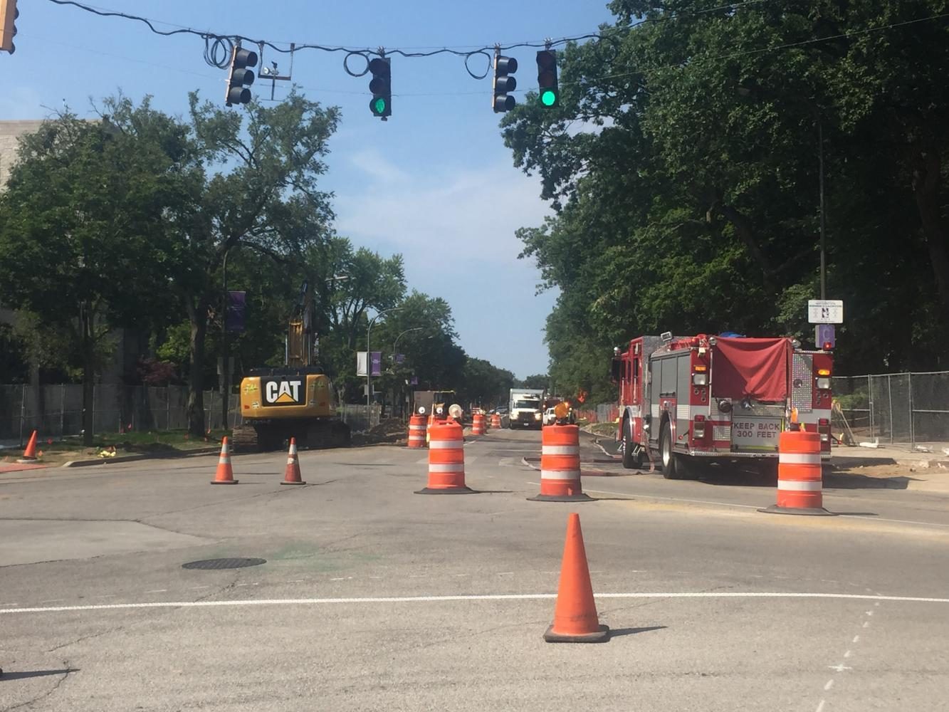 Construction workers and Evanston officers have blocked off the intersection of Sheridan Road and Chicago Avenue due to a gas main breach. No one has been injured.