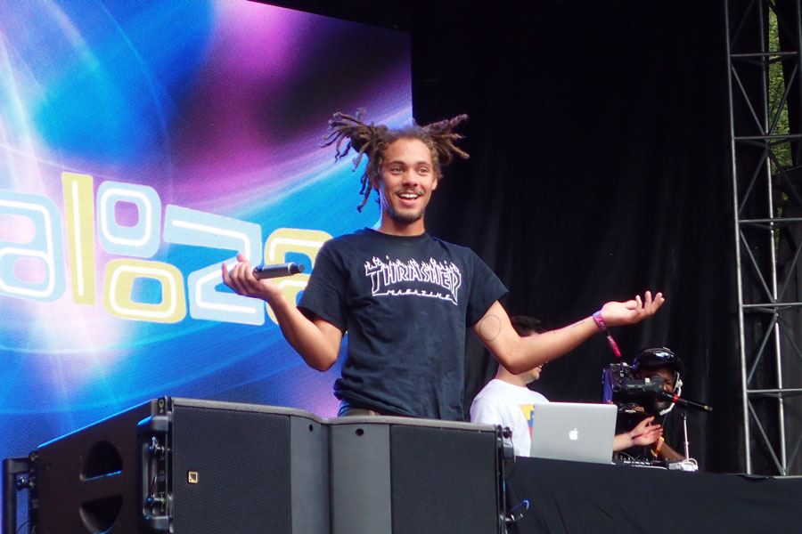 Kweku Collins performs on the Pepsi Stage at Lollapalooza on Thursday. Collins, an alumnus of ETHS, was in the first round of acts to perform at the festival.