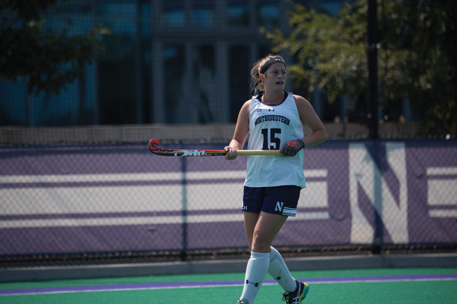 Kirsten+Mansfield+looks+upfield.+The+sophomore+defender+and+the+Wildcats+beat+Ohio+State+to+open+their+Big+Ten+slate.