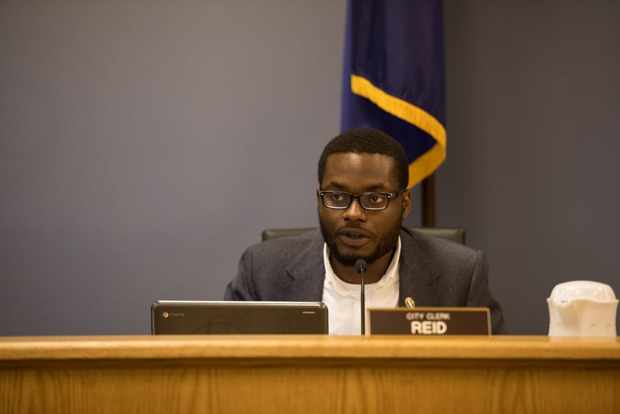 City clerk Devon Reid speaks at Monday’s City Council meeting. Reid said the city plans to implement a series of changes to the online Freedom of Information Act request system following a controversy in which the database disclosed confidential details.