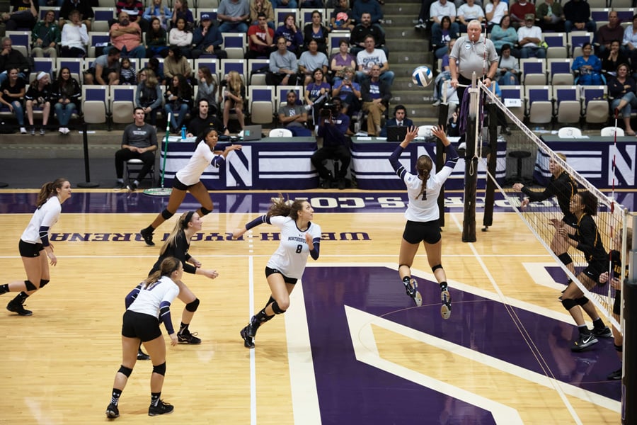 Taylor Tashima sets the ball to Symone Abbott. The seniors have helped lead the Wildcats to a 10-2 start this season.