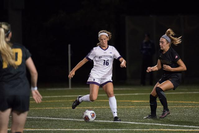 Mikayla Hampton dribbles the ball. The junior forward scored the second goal of her career for Northwestern on Sunday.