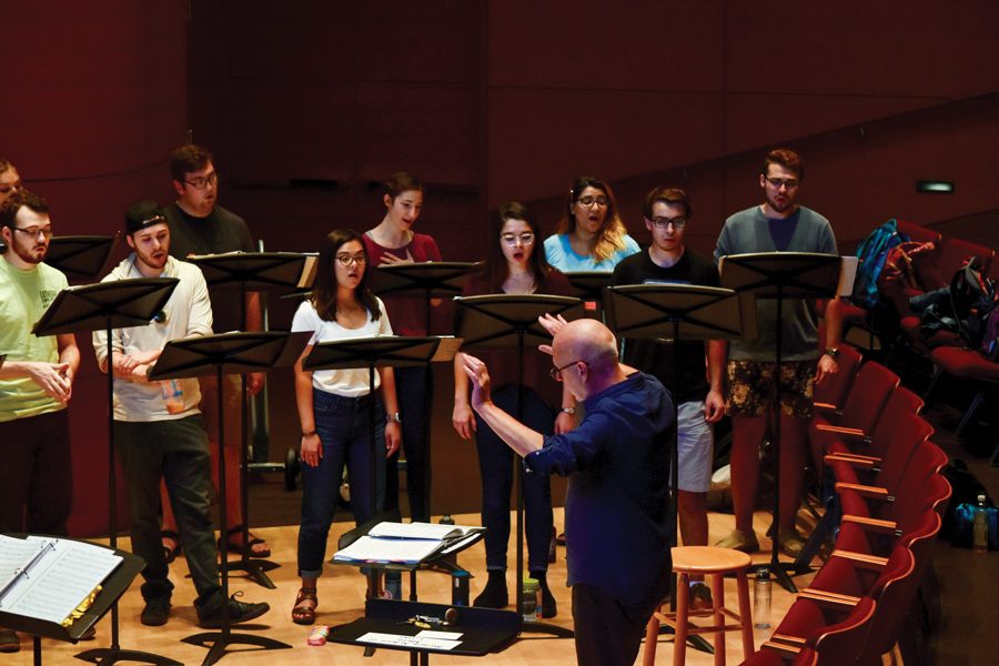 Donald Nally rehearses with the Bienen Contemporary/Early Vocal Ensemble in preparation for their concert featuring the works of Eric Whitacre. The group will perform with the composer at the University of Chicago’s Rockefeller Memorial Chapel on Oct. 13.