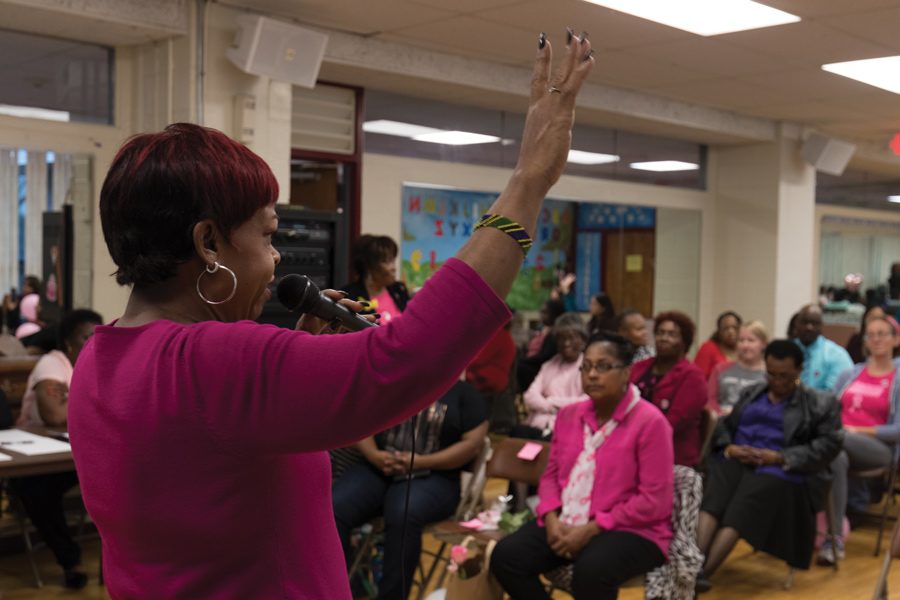 Evanston resident and breast cancer survivor Paula Williams speaks Sunday at the Fleetwood-Jourdain Community Center. Roughly 40 community members attended the event, which was held to raise awareness of the fight against breast cancer.
