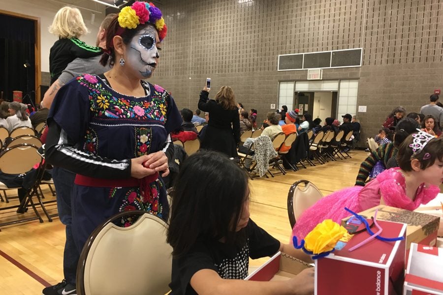 Rogers Park resident Martha de la Cruz, 36, attended Evanston’s Day of the Dead Celebration Sunday, dressed in skeletal makeup and clothing. This year’s event drew roughly 800 community members, an increase from 500 last year, city event coordinator Patricia Battaglia said.