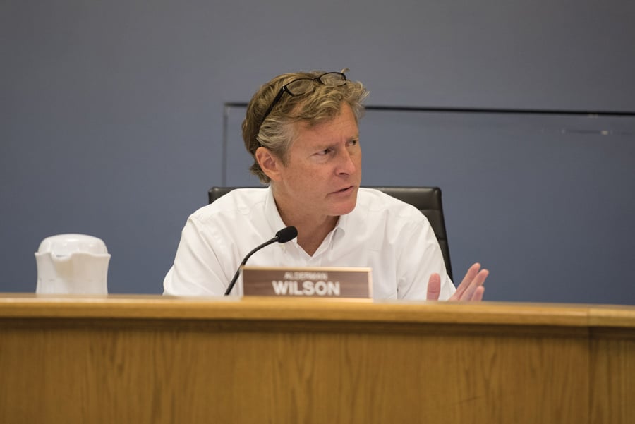 Ald. Donald Wilson (4th) speaks at a City Council meeting. Wilson, and other aldermen, said the 2009 Downtown Evanston development plan is outdated. 
