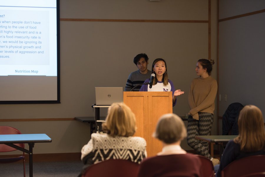 Northwestern+SESP+student+Joanne+Huang+presents+Evanston+food+insecurity+findings+at+Evanston+Public+Library+on+Wednesday.+The+meeting+was+nonprofit+Meals+at+Home%E2%80%99s+first+time+partnering+with+EPL.