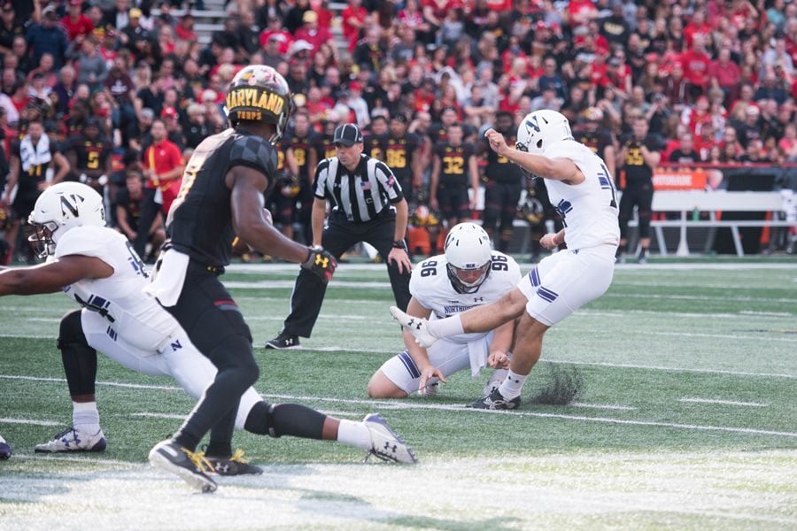 Charlie Kuhbander kicks. The freshman kicker knocked in three field goals and four extra points in Maryland last week.
