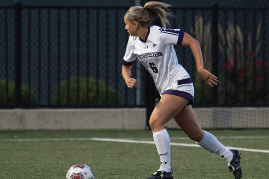 Kassidy Gorman dribbles the ball. The senior defender will help anchor the Wildcats’ back line in their upcoming match against Minnesota.
