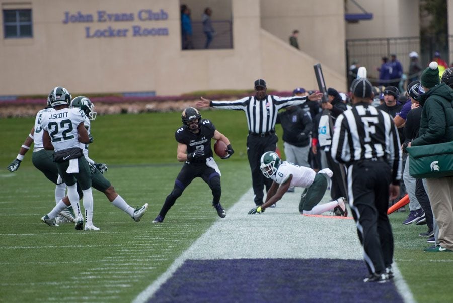 Flynn Nagel steps out of bounds. The junior receiver caught the final go-ahead touchdown in Northwesterns win over Michigan State on Saturday. 