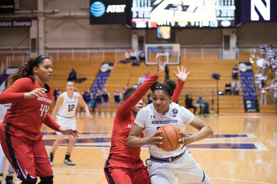 Amber Jamison drives to the basket. The junior guard has taken a “leave of absence” from Northwestern and will not play this season, coach Joe McKeown confirmed Thursday.