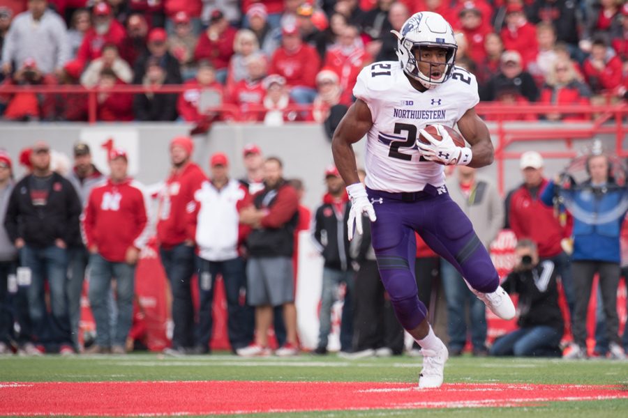 Justin Jackson runs with the ball. The senior running back helped lead the Wildcats to a one-sided win over Purdue last fall.