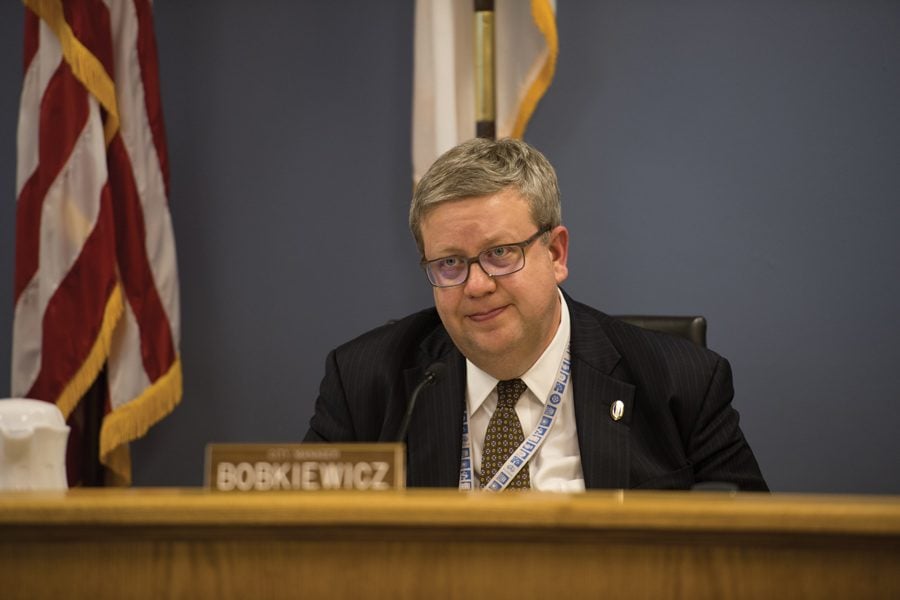 City manager Wally Bobkiewicz speaks at a City Council meeting. Bobkiewicz and other city staff members on Monday voiced concern about the potential reduction of victim services advocates.
