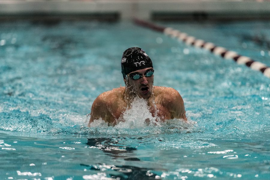 A Northwestern swimmer races. The Wildcats will take on Wisconsin on Saturday. 
