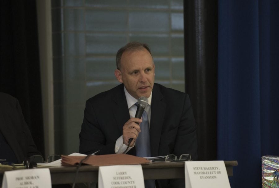 Evanston Mayor Steve Hagerty speaks at a panel. Hagerty joined other mayors Tuesday in signing the Chicago Climate Charter to reaffirm his commitment to fighting climate change. 