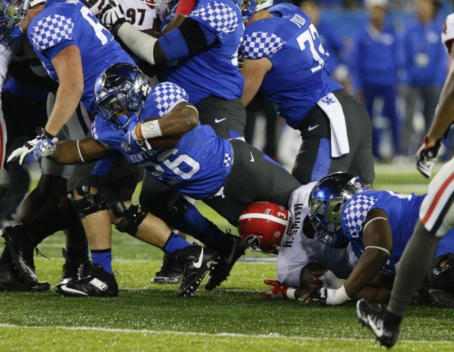 Kentucky running back Benny Snell lunges forward during a game against Georgia in the 2016 season. Snell will be the top threat on Kentucky’s offense in Friday’s bowl game against Northwestern.