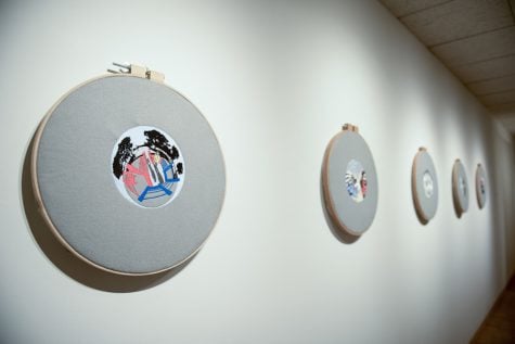 Sabba Elahi’s art displayed at the Dittmar Gallery. Elahi, whose work explores the intersection of surveillance and domestic life, created both hand-crafted and machine-crafted embroideries.