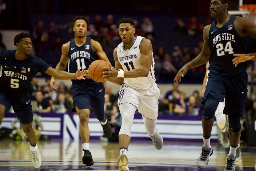 Anthony Gaines looks to make a pass. The freshman guard had another effective day off the bench for NU.