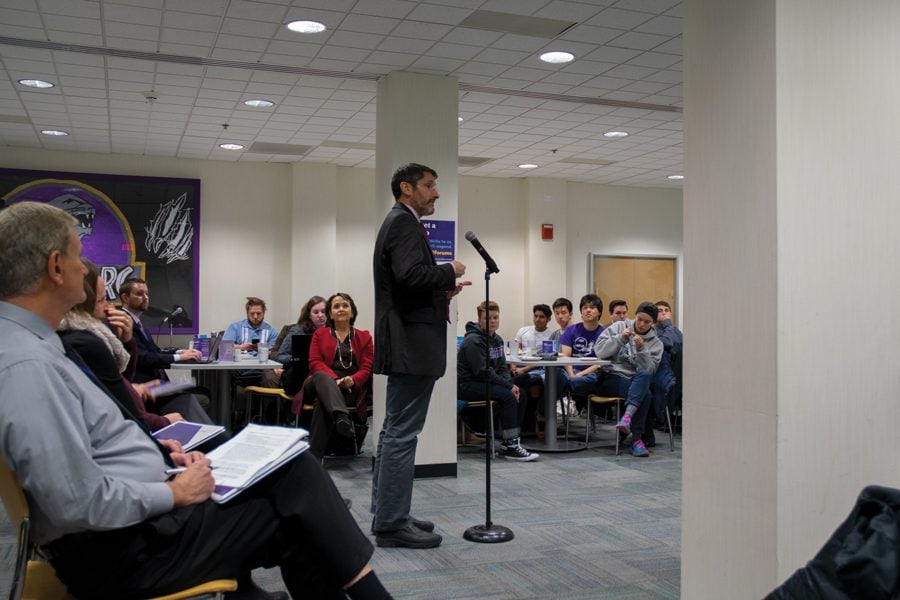 Brad Zakarin speaks to students, faculty and staff at a forum on the recently released Undergraduate Residential Experience Committee report. Many students raised concerns about the elimination of residential colleges and permanently themed houses in the proposed framework.
