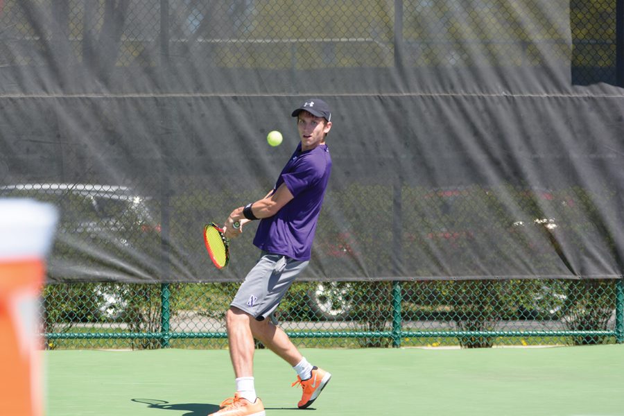 Ben Vandixhorn lines up a backhand. The junior and the Wildcats split a pair of matches over the weekend.