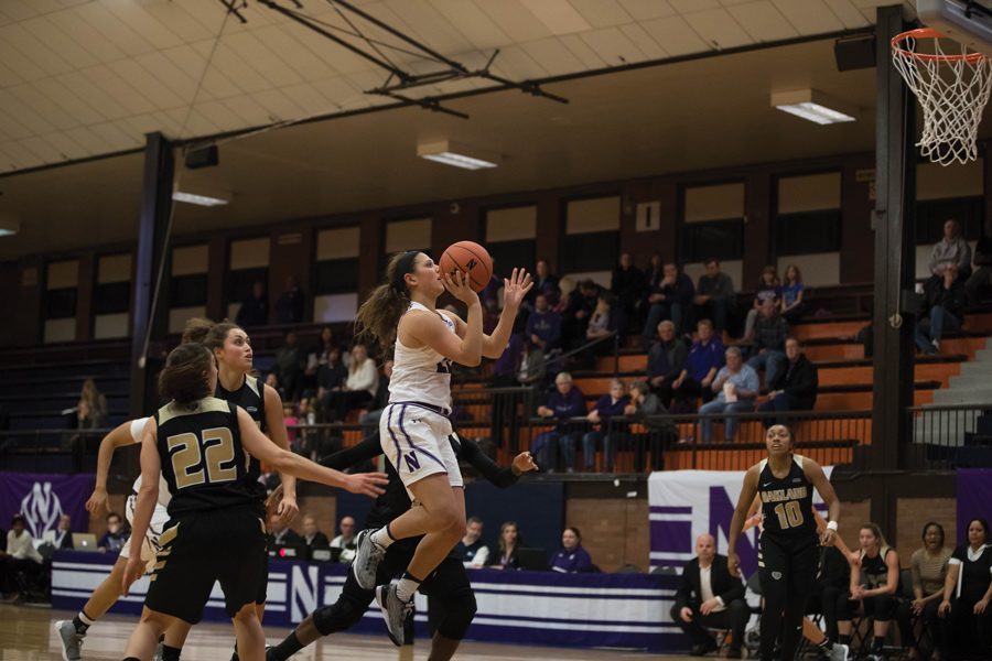 Byrdy Galernik takes a floater. The sophomore guard will look to help NU win its second conference game Thursday against Wisconsin.
