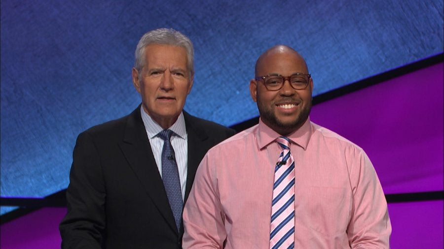 Brandon Brooks (Weinberg ‘04) poses with ‘Jeopardy!’ host Alex Trebek. Brooks competed for three days, completing two come-from-behind victories.