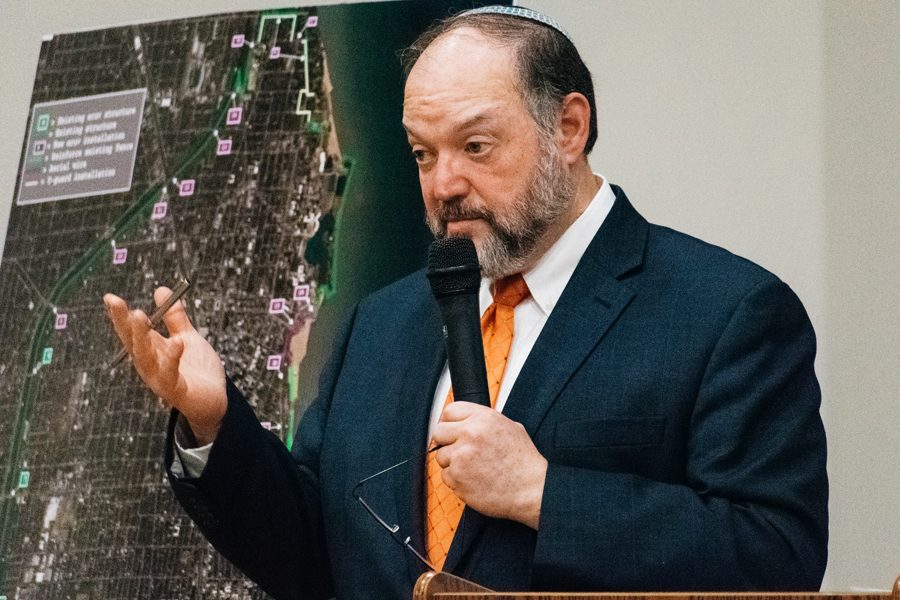 Robert Matanky speaks at a community meeting. Matanky said the expansion of an eruv into Evanston would draw more practicing Jewish families to Evanston.  