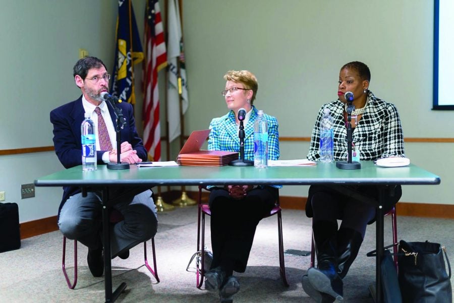 Evonda Thomas-Smith (right) on a panel in 2014. Thomas-Smith will be honored for her contributions to public health at an event Friday.