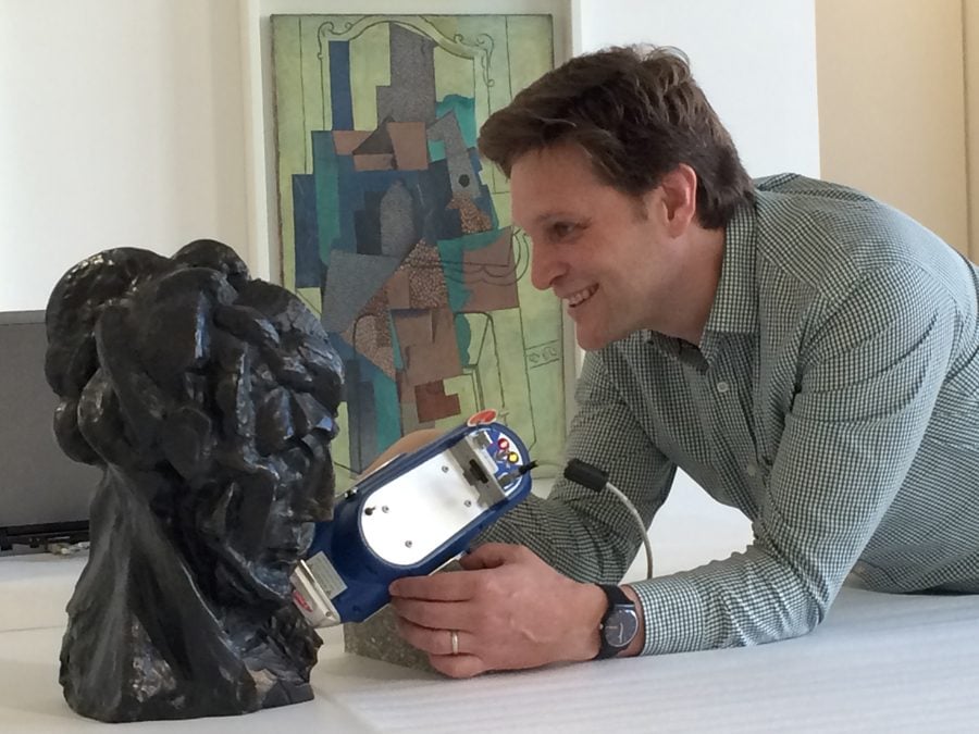 Marc Walton uses a portable instrument to analyze the alloys of Picasso’s bronzes. Walton and other NU-ACCESS researchers discovered that five of Picasso’s bronzes were created at the foundry of Émilie Robecchi. 