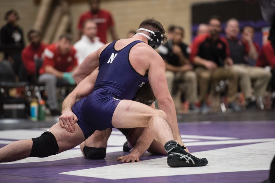 Zach Chakonis battles with an opponent. The sophomore pinned his opponent in the Wildcats’ beatdown of SIU-E.
