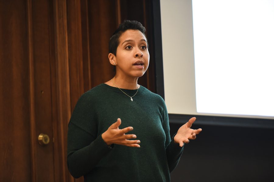 Joanna Thompson speaks Friday at an ASG-sponsored event in Harris Hall. Thompson talked about stigmatization and violence in LGBTQ relationships.
